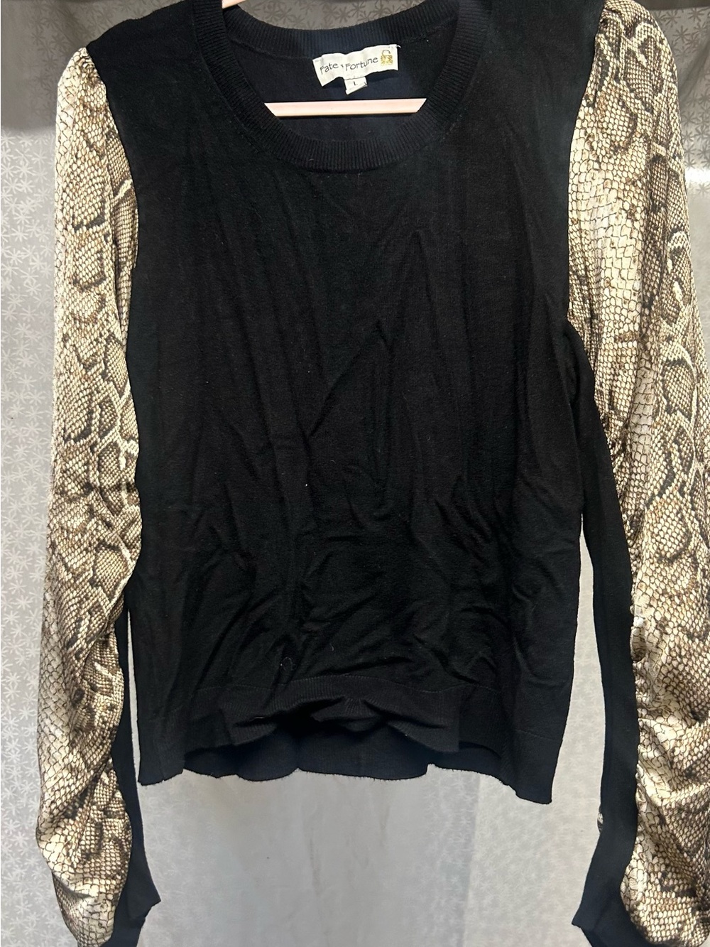 Anthropologie Black Top with Snake-Print Sleeves
